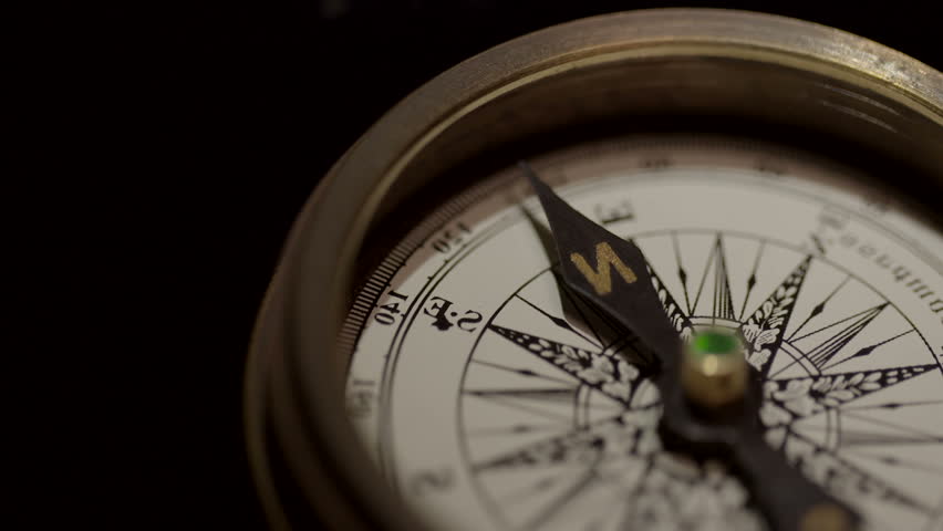 Close up shot of a spinning vintage compass | Shutterstock HD Video #1028232878