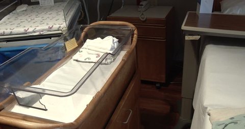 Baby Bassinet And Warming Table In Hospital Delivery Room