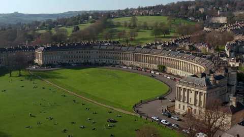 Aerial view of the Royal Crescent in the city of Bath (UK) with people enjoying the spring sunshine