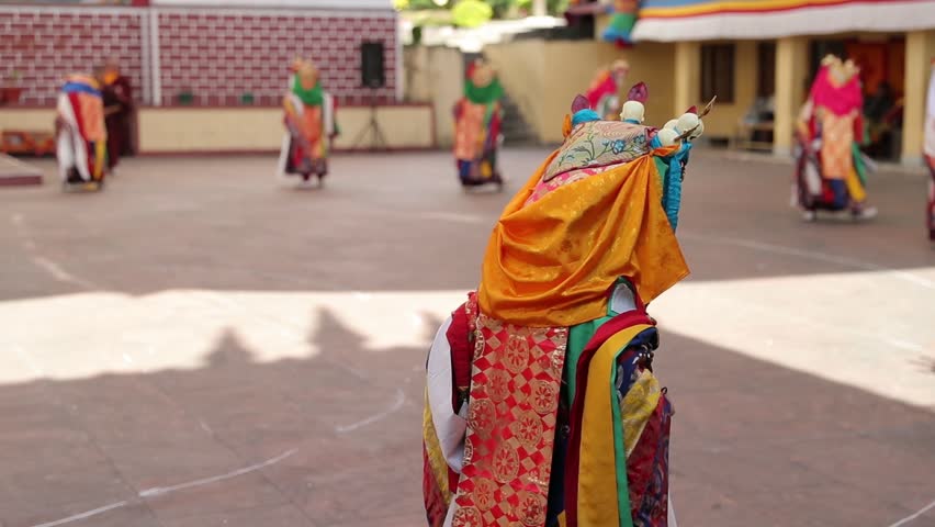 Tibetan dance in Buddhism temple at the ceremony in Tibetan colony at Indian Himachal Pradesh. Filmed in slow motion. | Shutterstock HD Video #1028265632