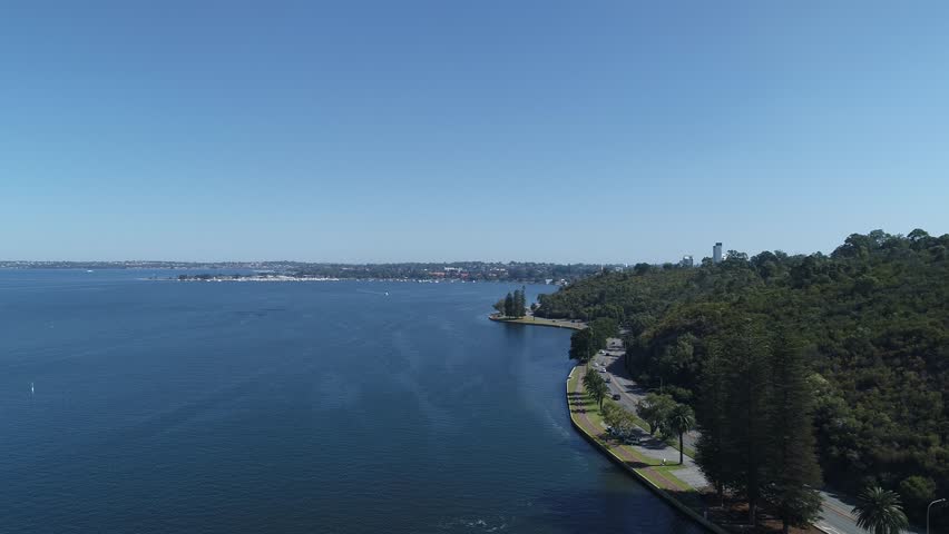 Aerial views over the Swan River Perth Western Australia towards Matilda Bay and Nedlands with views of Kings Park