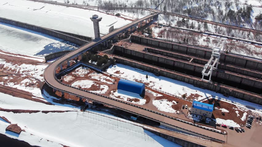 gateways for ships on the river, aerial shooting from a drone, spring ice drift