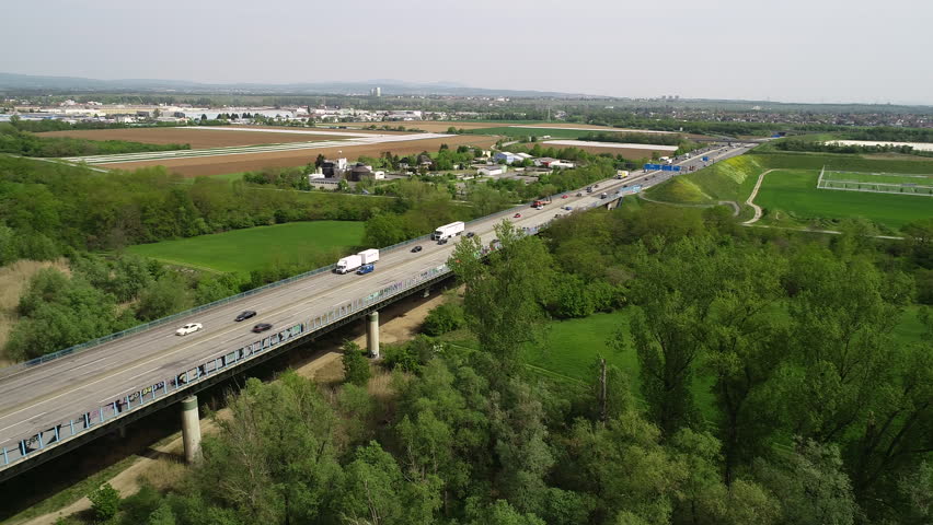 Aerial view of highway bridge and River Rhine - tracking shot