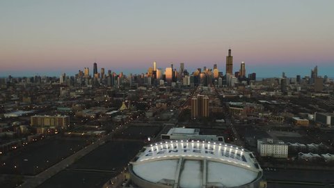 Chicago, Illinois / USA - April 21, 2019: Orbit Right, Pan Down United Center - Sunset [4k]