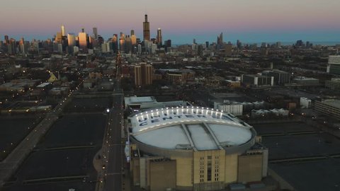 Chicago, Illinois / USA - April 21, 2019: Orbit Right, Pan Up United Center - Sunset [4k]