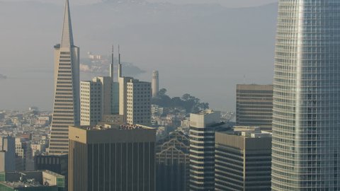 Aerial view of Coit Tower Alcatraz Island and Downtown city office skyscrapers smoke haze from Northern forest wildfires San Francisco California America RED WEAPON