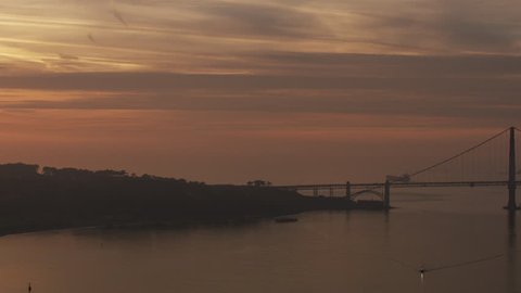 Aerial sunset view of Fort Point historic site Golden Gate Bridge San Francisco at dusk air polluted red sky from wildfires USA RED WEAPON