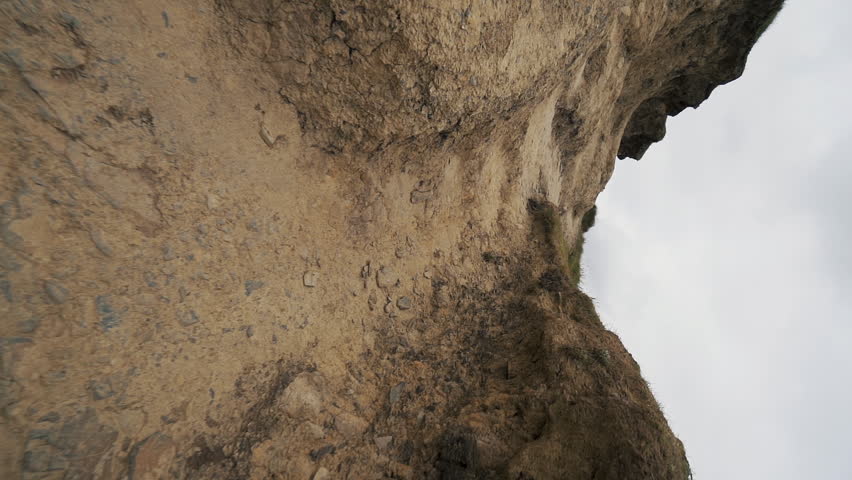 Hiking Up Path at Cliffs of Moher in Ireland Slow Motion Vertical Video