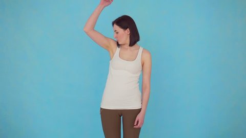 young woman having problem sweat under armpit