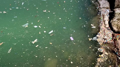 Trash, plastic, garbage, bottle... environmental pollution on the beach - Sea Pollution