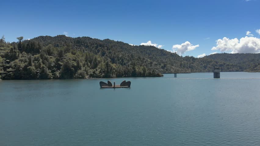 Aerial drone footage of a overflow on a water reservoir