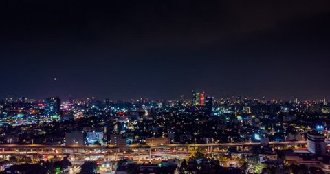 Aerial hyperlapse of Mexico City at night in the San Antonio freeway