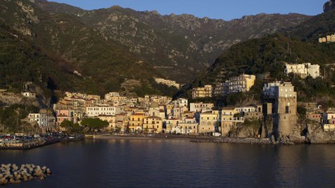 Aerial view of the buildings along the coast by the water in Positano Amalfi Coast, Italy. 4k aerial landscape : vidéo de stock