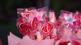 red lollipop at party . - Powered by Shutterstock - Get 15% off with code: PIKWIZARD15