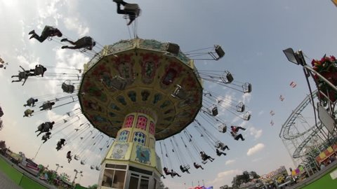 Aguascalientes, Mexico. 04/24/2017 rides in festival and fair, flying chairs, volantínes, ferris wheel, fun in spring carnival of the National San Marcos Fair in Aguascalientes