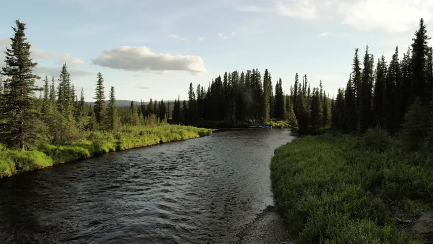 Flowing water of the Gulkana River taken with DJI drone. Beautiful summer day in interior Alaska.