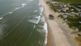 Aerial drone shutting video with coastal building from Nags Head North Carolina