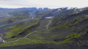 Drone aerial view of the beautiful unique landscape of Thorsmork in highland of Iceland. The natural terrain is famous for outdoors trekking and hiking.