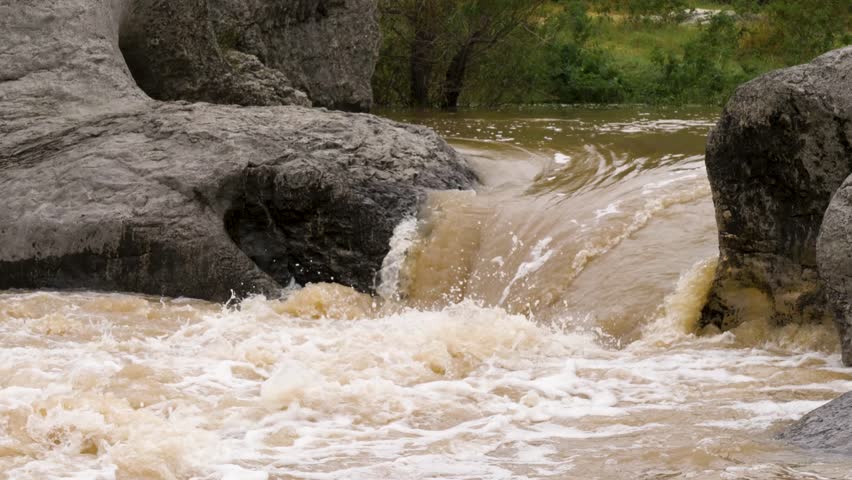 Heavy Flood waters and rapids channel through rocky terrain during floods at Pedernales Falls State Park in Texas. Flooding from October 2018, south of Austin, Texas.