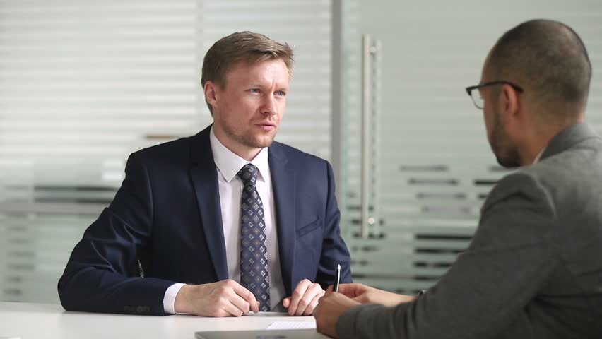 Confident businessman in suit investment advisor broker or bank manager consulting client customer about insurance loan services handshake partner make deal shake hands at office business meeting Royalty-Free Stock Footage #1028495339