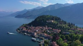 Aerial drone rotational video of iconic village of Bellagio in lake Como one of the most beautiful and deepest in Europe, Lombardy, Italy