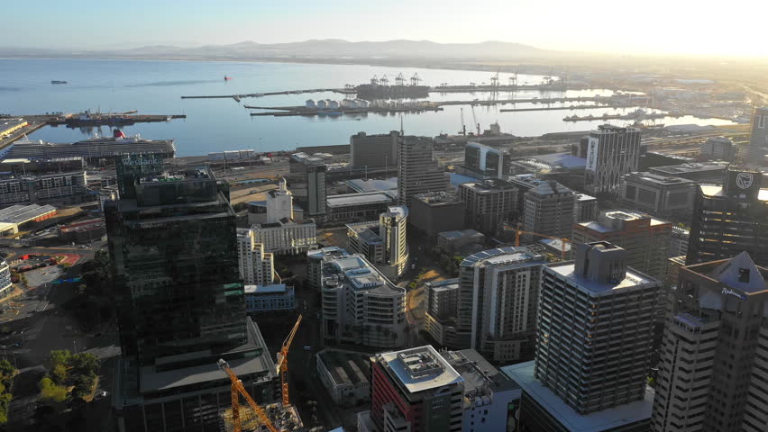 An aerial shot tracking forward and flying over Cape Town