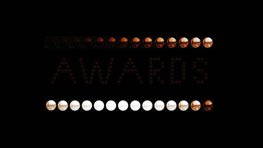 Awards Text sign Seamless Loop animation bulbs LED pixels, light flashing, blinking lights advertising banner. Light Text. Digital Display. More TEXTS are available in my portfolio. 
With Dots Motion. Royalty-Free Stock Footage #1028505914
