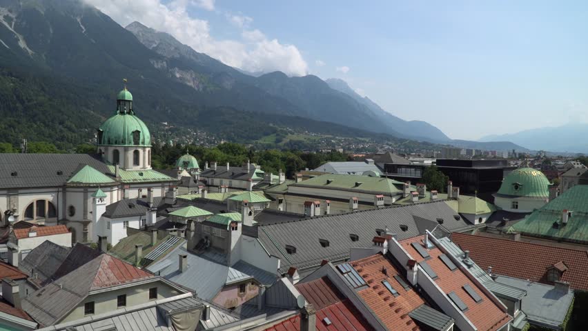 Innsbruck, capital of Tyrol in Austria. Beautiful old town in the center of the city with blue sky weather. Nice view from the old city tower on roofs and churches.