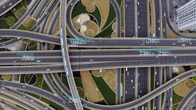 Concept of aerial view from above of traffic on elevated expressway with futuristic autonomous, driverless car, train using artificial intelligence computer network and satellite gps for navigation - Powered by Shutterstock - Get 15% off with code: PIKWIZARD15