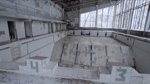Dolly Shot of Abandoned Pool in Pripyat During Winter