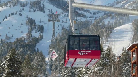Jackson, WY / USA - February 19 2016: Ski Lift Above Jackson Hole Ski Resort, Snowy Mountain Landscape Vacation Tourism Shot