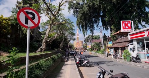 Ubud, Bali / Indonesia - April 22, 2019 : Bade or great tower from the royal cremation of  Kumuda Sari Ubud Palace far view from Sambahan street.