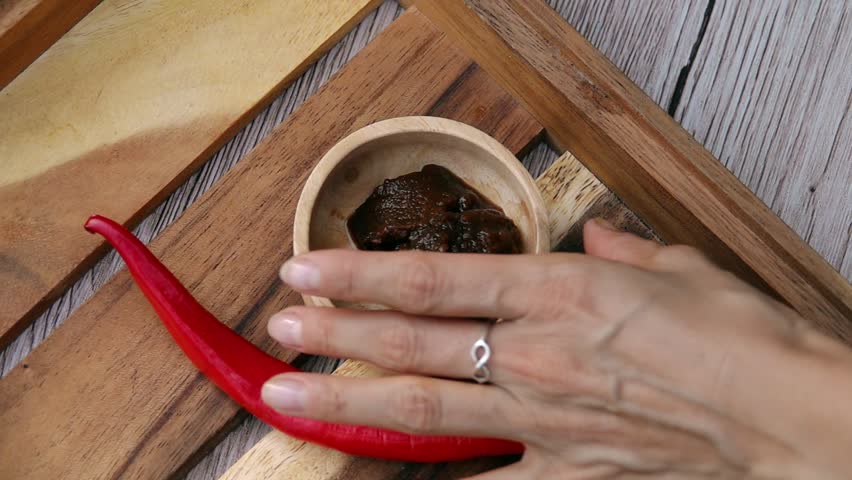 Female Hands Taking Miso Paste from Tray. Top View. Vegan and Vegeterian Food. Lifestyle of Health and Sustainability Concept