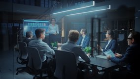 In the Corporate Meeting Room: Female Executive Talks and Uses Digital Interactive Whiteboard for Presentation to a Board of Directors, Investors. Screen Shows Growth Data. Late at Night Office - Powered by Shutterstock - Get 15% off with code: PIKWIZARD15