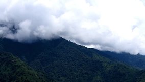 Timelapse footage of moving clouds over mountain of Eastern Himalaya.