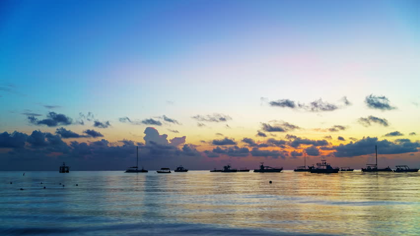 Time lapse of beautiful cloudy sunrise over ocean in Dominican Republic