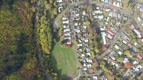 4K Aerial footage of Arrow towm , village and mountain with autumn leaves in autumn season at South island of New zealand.