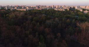 Aerial view of the park and farmstead Kuskovo.
Drone video of park and lake complex and manor house Kuskovo at sunset time. Moscow, Russia.