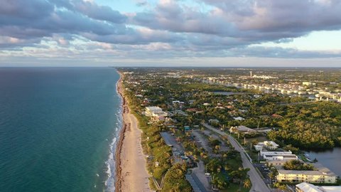 A Beautiful Boynton Beach Florida Sunrise, Descending From Up High, Flying Towards the South, Along The Shoreline focusing on the Horizon