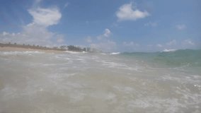 Turbulent Waves Crash Directly into Us in 240 fps Super Slow-Motion in a First-Person Point-of-View Facing North in the Late Morning Sun at the Shoreline of Fort Lauderdale, Florida Beach