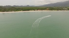 4K aerial video over people boating on the beach of Langkawi, Malaysia