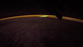Planet Earth seen from the International Space Station with Aurora Borealis over the earth, Time Lapse 4K. Images courtesy of NASA Johnson Space Center. Noisy video due to low light condition.