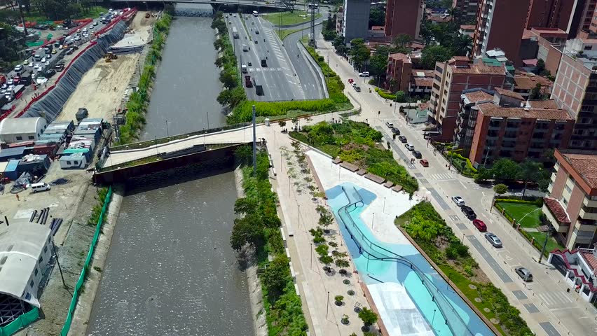 Arial tilting shot of Parques del Río Medellín, Colombia