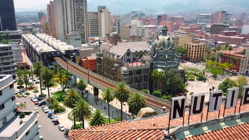 Beautiful revealing shot of Botero square and metro station in Medellin