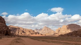 Desert landscape, Wadi Rum, Kingdom of Jordan. Clouds and shadows move fast. Time lapse video.