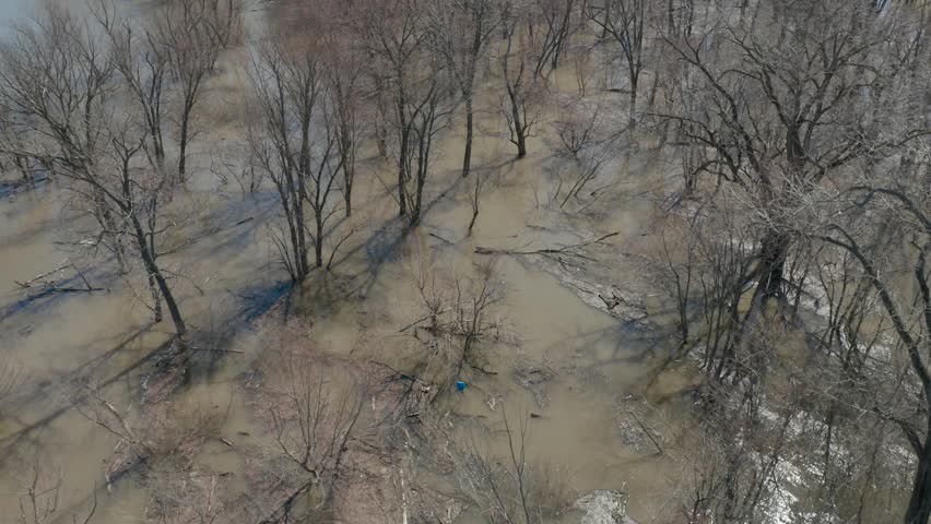 4K flood footage along Mississippi River, state of emergency. Water level high on houses. High bit rate.