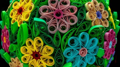 Handmade. Quilling. Multi-colored flowers. Rotation. 4K