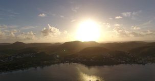 A beautiful sunrise over martinique in St. Anne Bay in the caribbean.
