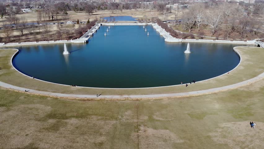 A low aerial flight over a pond at Art Hill in Saint Louis, Missouri.