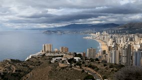 Benidorm Spain 1st May 2019: The beautiful south beach at Benidorm, aerial footage showing hotels and apartments and the  golden sandy beaches.